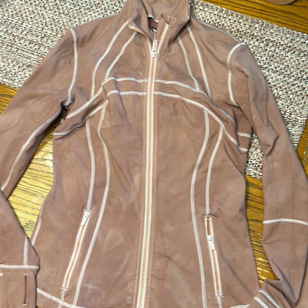 Women’s size 4 Lululemon jacket. Pinkish color.